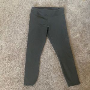 Dark olive fabletics Powerhold workout leggings.